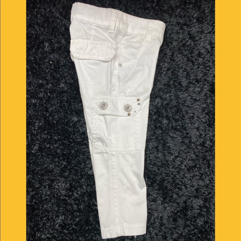 Justice, white pants with metal accents, size 6s,